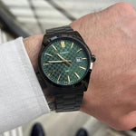 RELOJ CASIO CON ESFERA VERDE Y LOS NUMEROS DORADOS